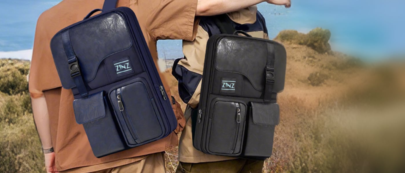 Two slim ZINZ packs carried on a coast trail